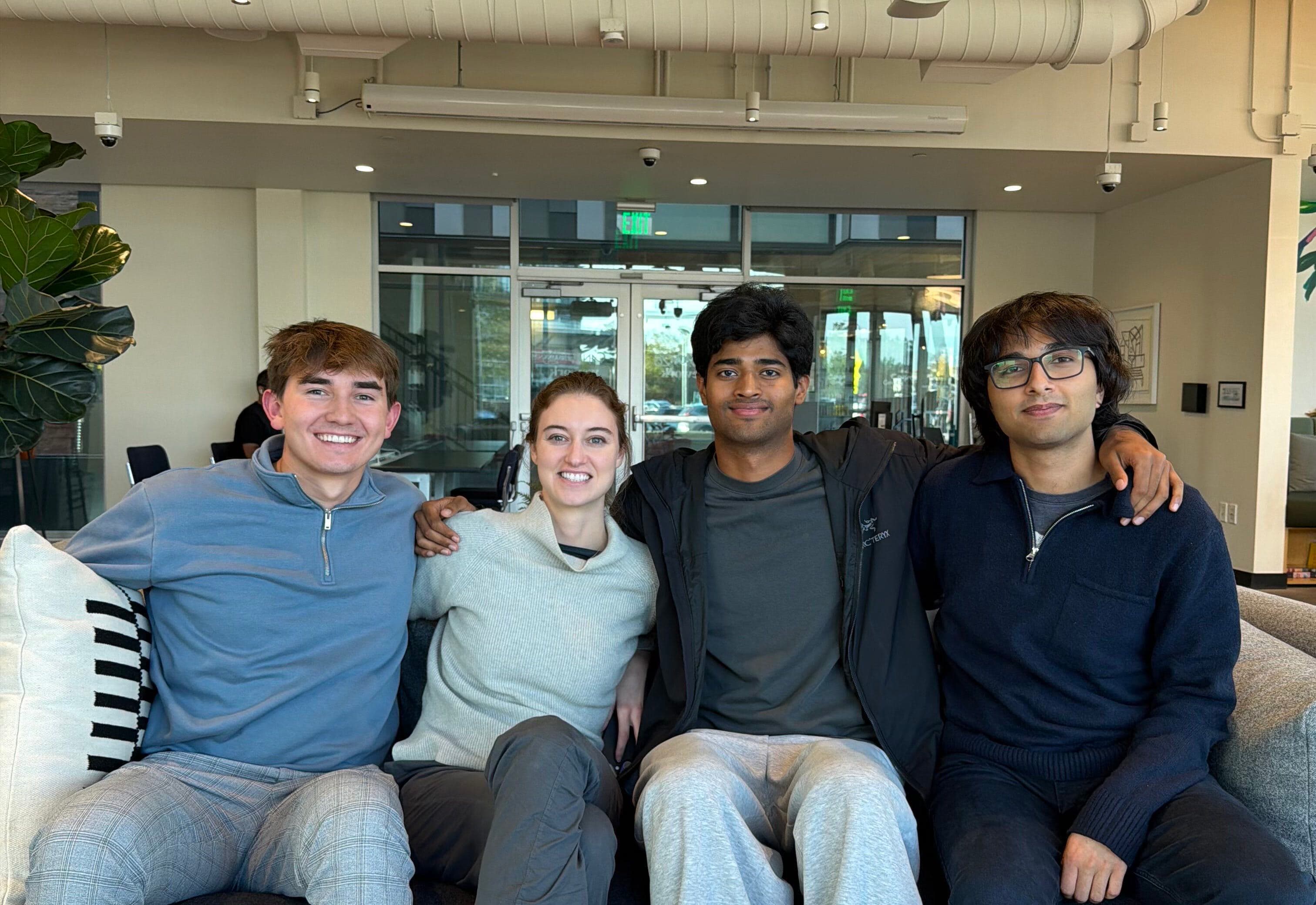 The Edvise founders and EdSights team sitting together on a couch